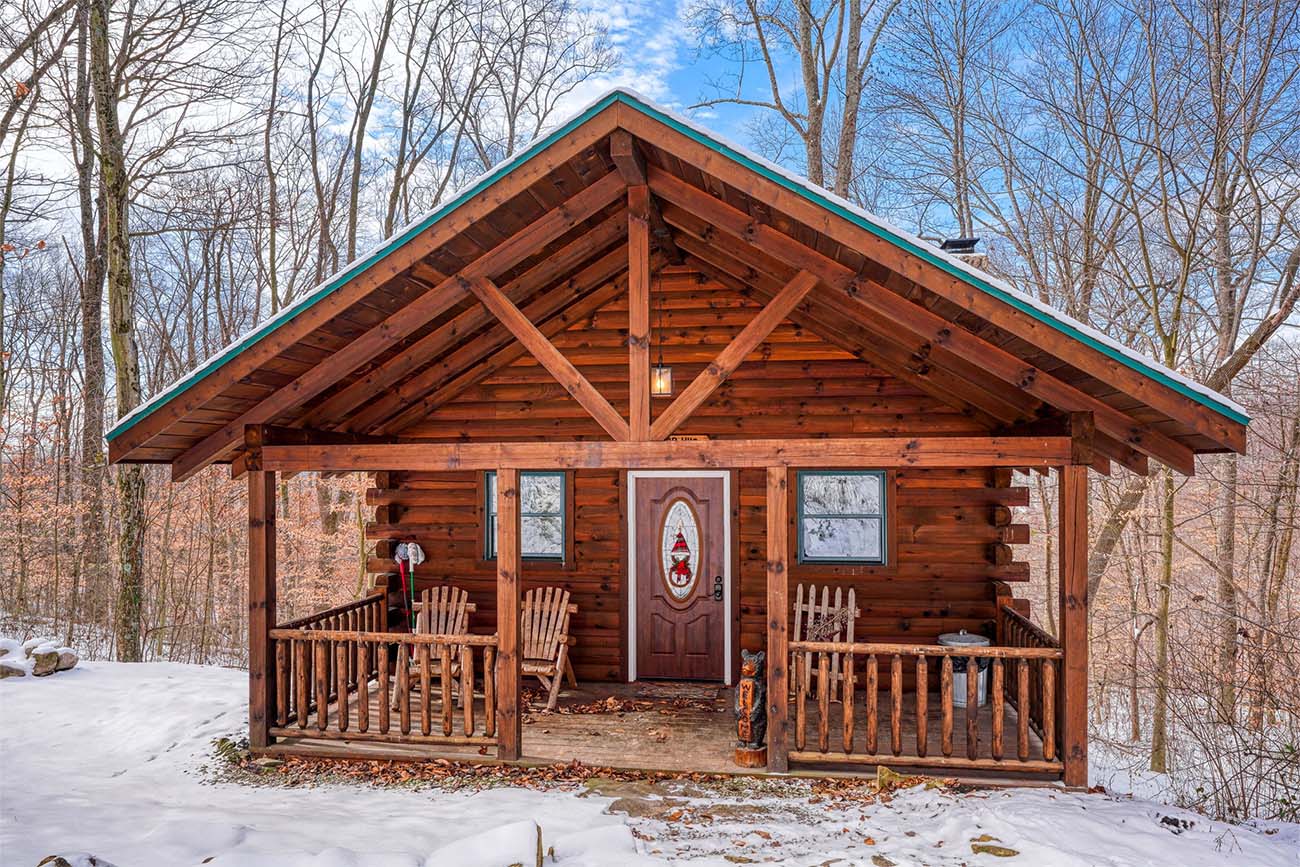 front porch of cabin in woods