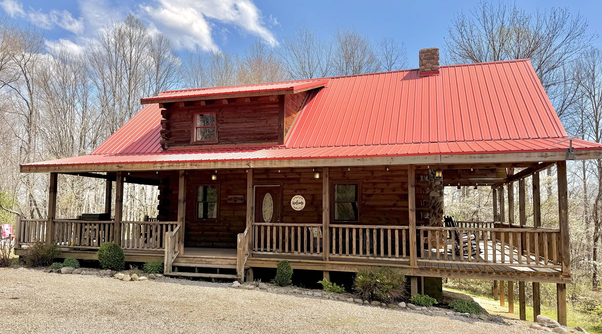 front porch of cabin in woods